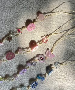 MÓC KHÓA ĐIỆN THOẠI CÓ CHARM NÚT ĐỘC ĐÁO